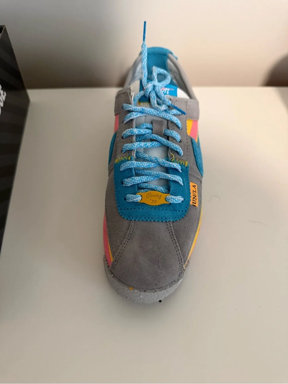 Nike Women's Gray Sneakers with Blue, Pink & Yellow Accents